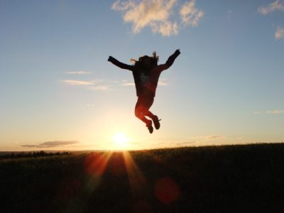 women jumping in victory